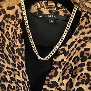 Gucci silk dress with the Gucci logo in the pattern!